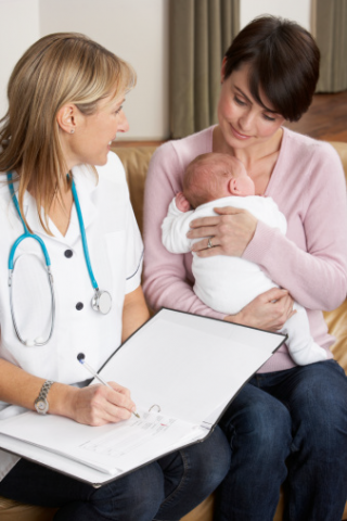 image of a midwife working with a new mother