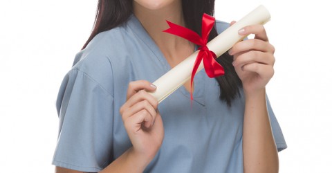 Attractive Mixed Race Female Nurse or Doctor Wearing Scrubs and