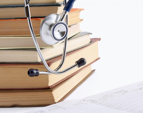 Concept of medical education with book and stethoscope